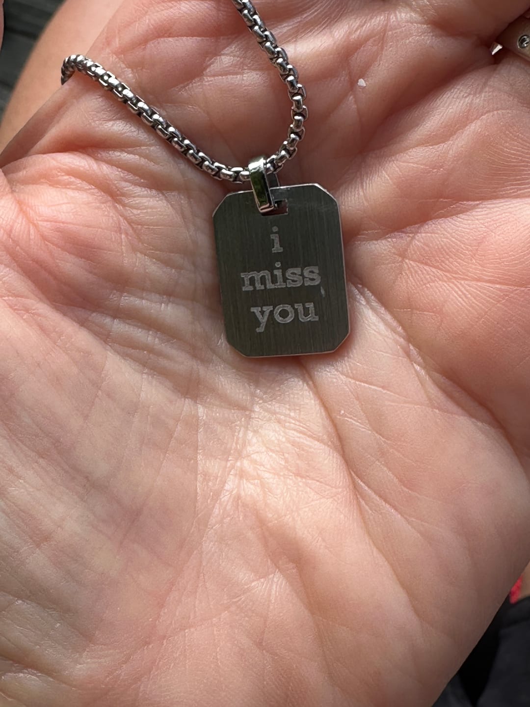 Customer photo review of Mini Matte Modern Dog Tag