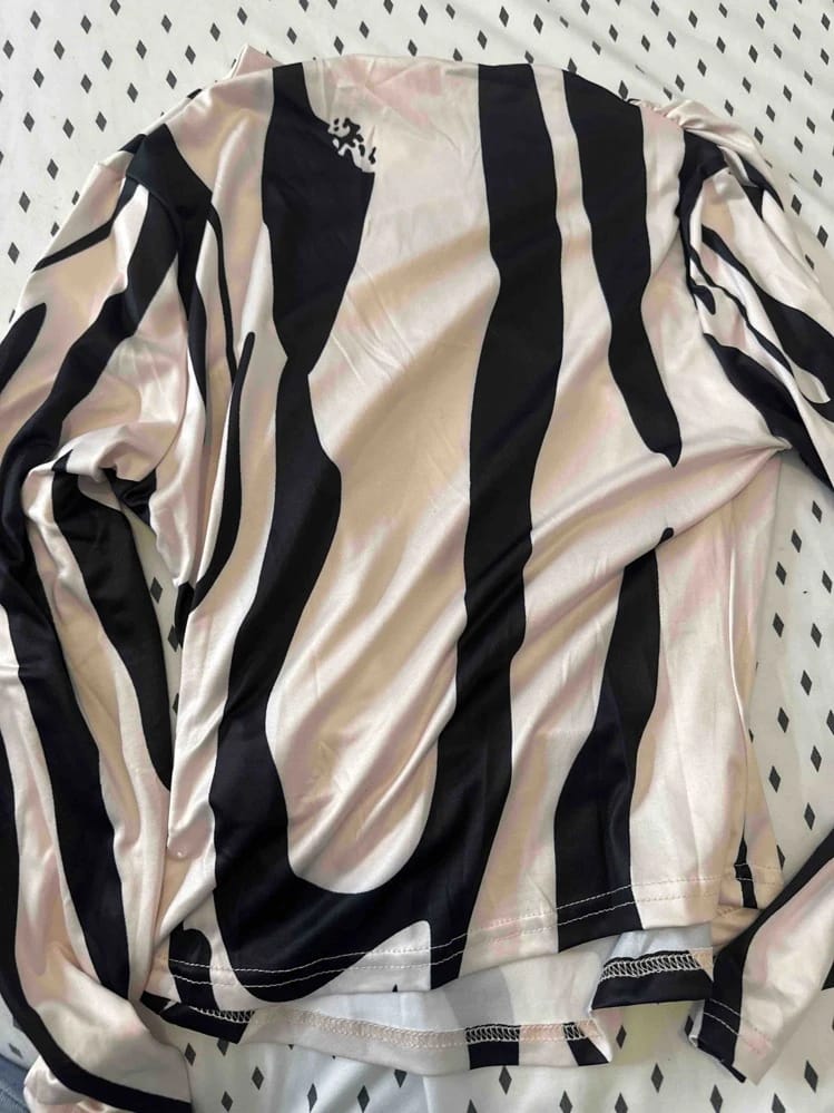 Customer photo review of Ninonine "Sloane" | Abstract Geometric Mock Neck Top