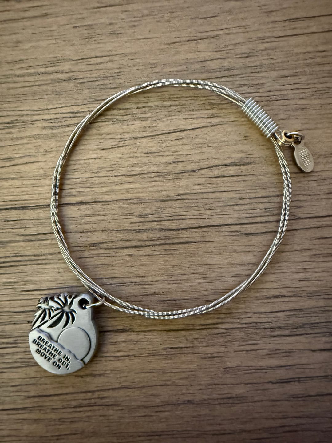Customer photo review of “Breathe In, Breathe Out, Move On” Guitar String Bracelet