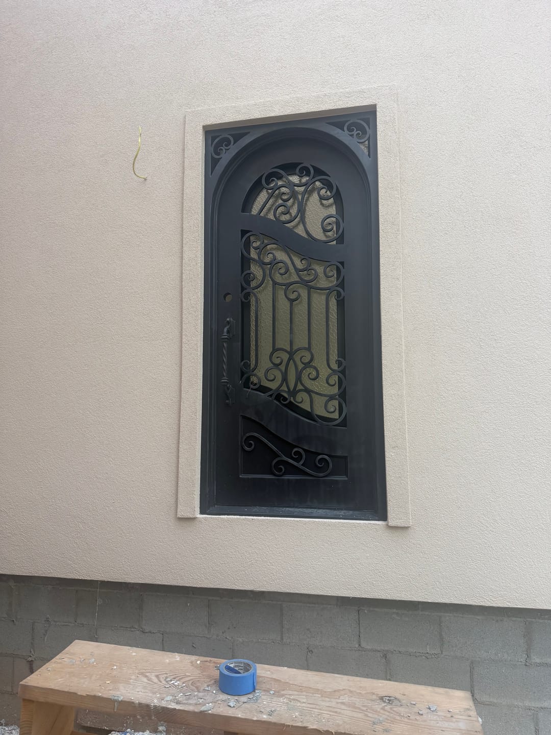 Customer photo review of Calvert Model Pre Hung Single Front Entry Wrought Iron Door With Rain Glass Matt Black Finish