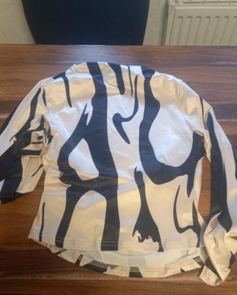 Customer photo review of Ninonine "Sloane" | Abstract Geometric Mock Neck Top