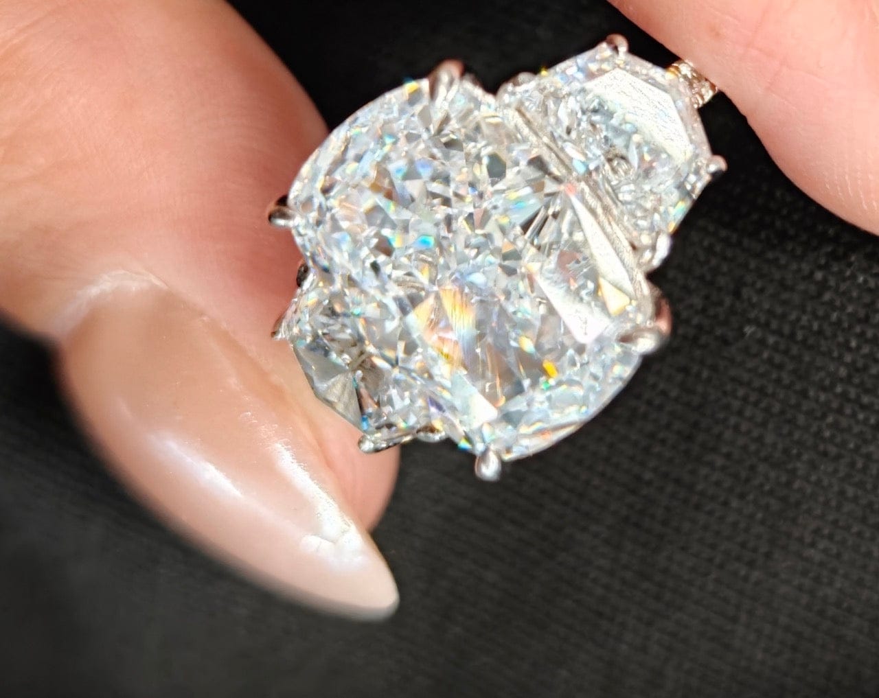 Customer photo review of 6.0 Ct Elongated Cushion Cut Simulated Diamond Three-Stone Travel Engagement Ring in S925 Sterling Silver