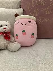Customer photo review of Cute Kawaii Boba Tea Plush Toy – Soft Strawberry Milk Tea Stuffed Plushie & Huggable Throw Pillow Cushion