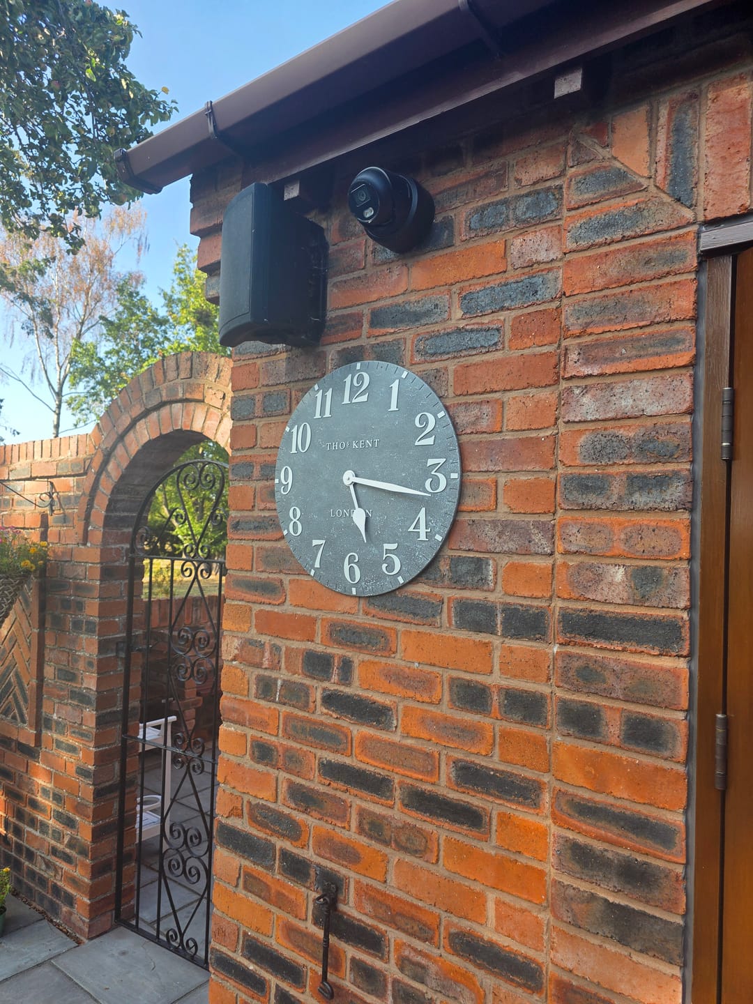 Customer photo review of Thomas Kent London. Arabic Outdoor Wall Clock 20" (51cm)