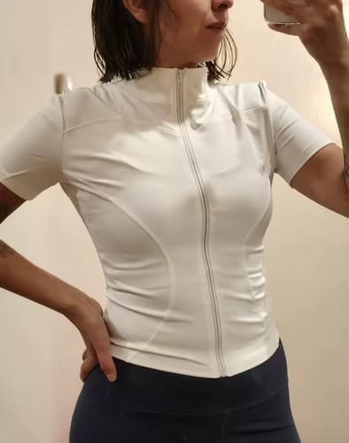 Customer photo review of Women’s Short-Sleeve Workout Top – Sculpt Zip