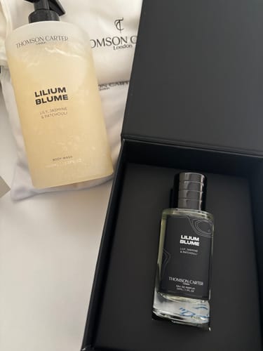 Customer's Lilium Blume body wash and perfume fragrance bundle in a black box.
