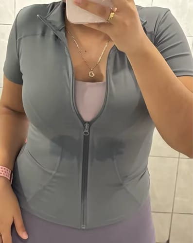 Customer photo review of Women’s Short-Sleeve Workout Top – Sculpt Zip