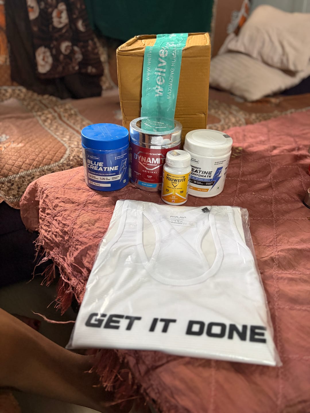 Customer photo review of Wellcore - Micronised Creatine Monohydrate (83 Servings, Tropical Tango) + Premium Gym Vest