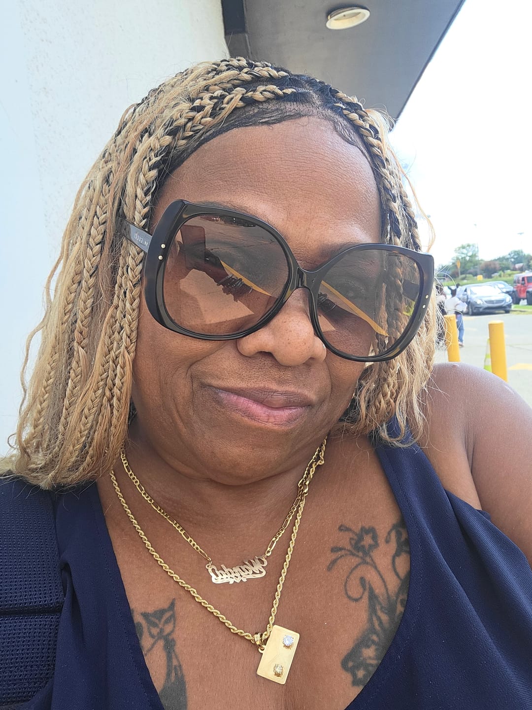 Customer photo review of Essential Choice: 16-36" Human Hair Boho Curls Hand Tied Swiss HD Full Lace Knotless Braided Wig