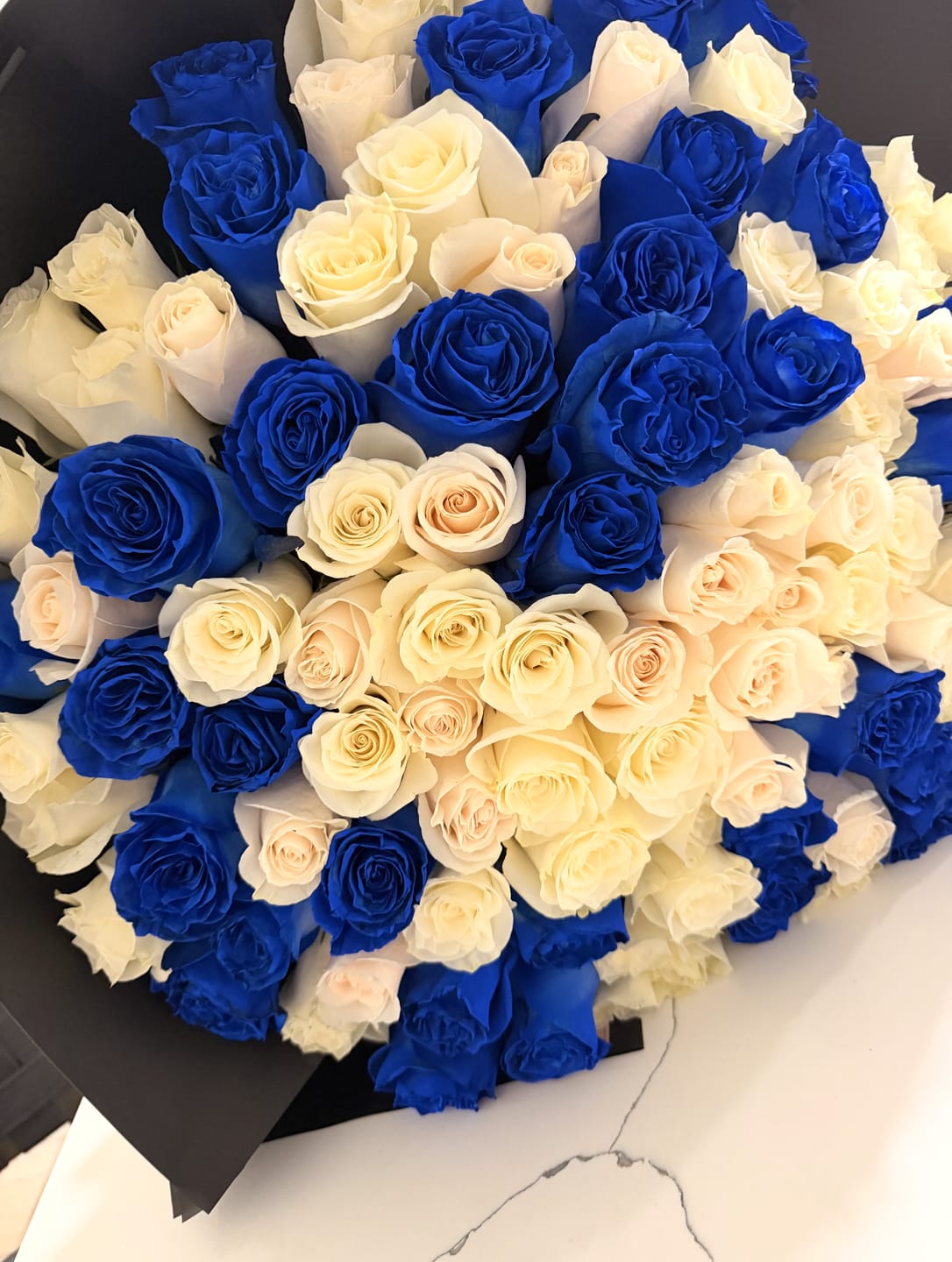 Customer photo review of Blue & White Rose Bouquet