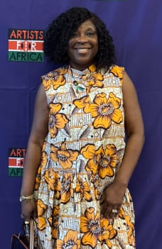 Customer photo review of LAILA AFRICAN PRINT SLEEVELESS TIERED BUTTON DRESS