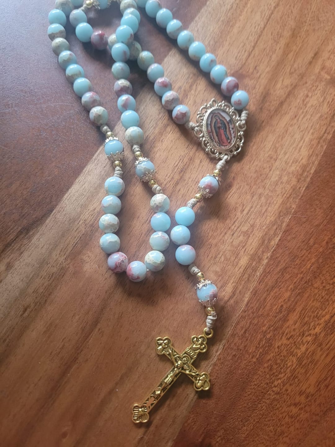 Customer photo review of Christianartworkshop Aqua Stone Prayer Rosary with Gold Accents: A Divine Source of Peace and Devotion