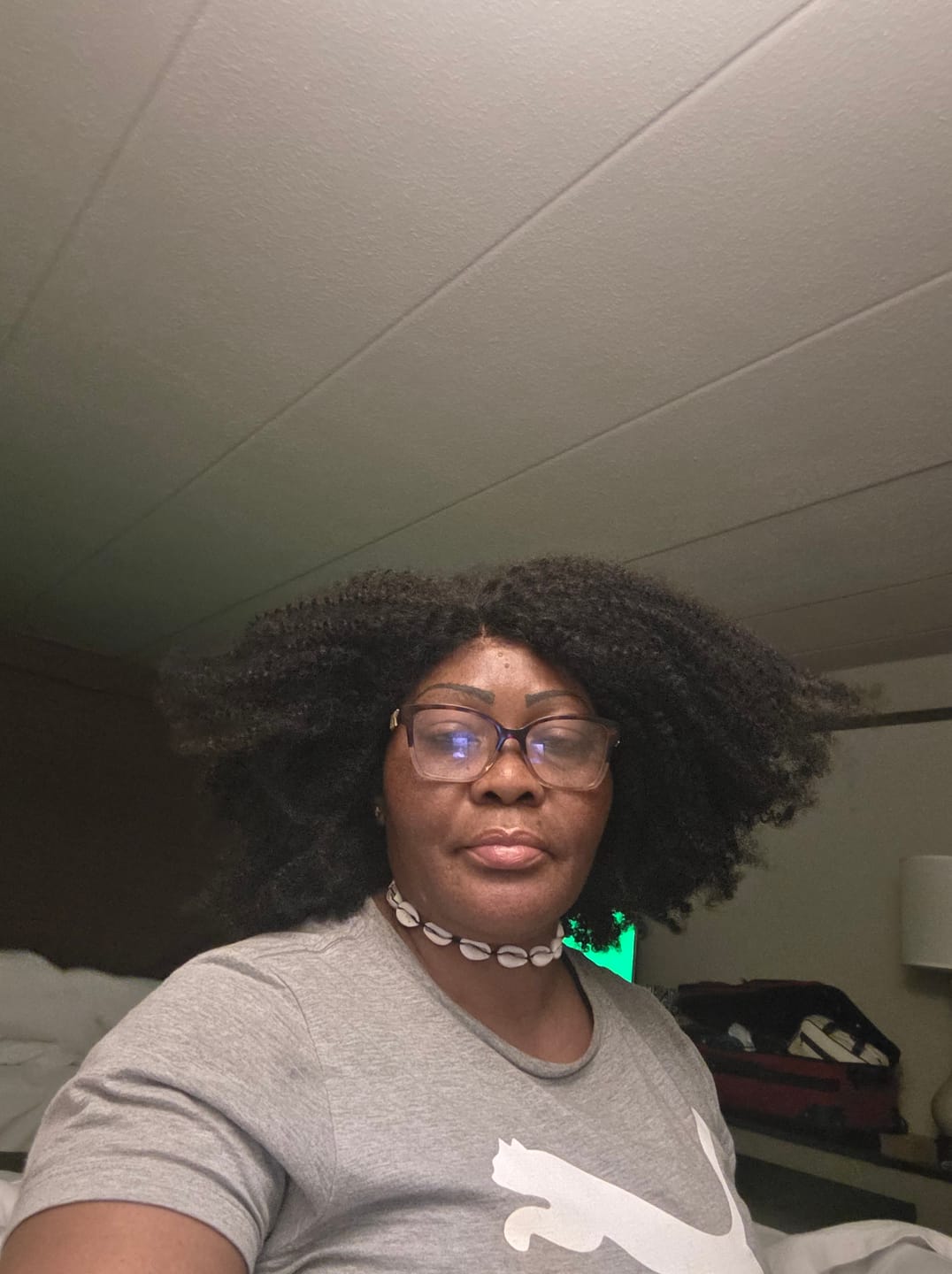Customer photo review of Undetectable Skin Melt Clear Lace Kinky Curly Brazilian 13 x 6 Lace Front Wig LFC09