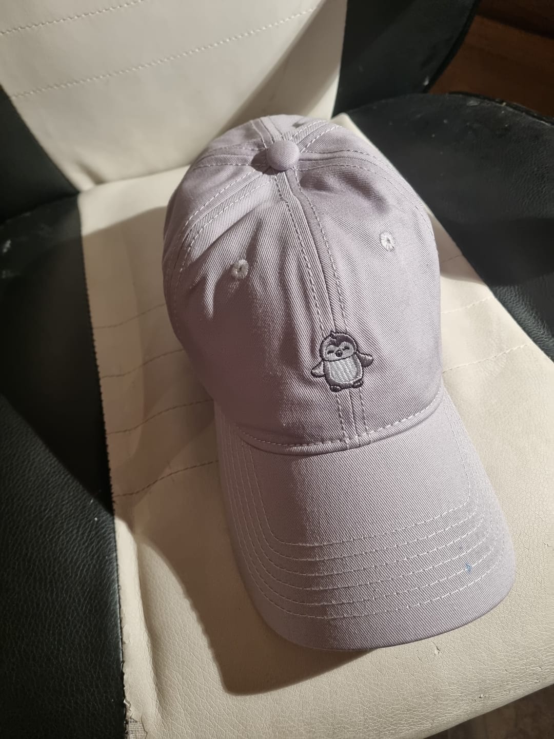 Customer photo review of Penguin Adoption Cap