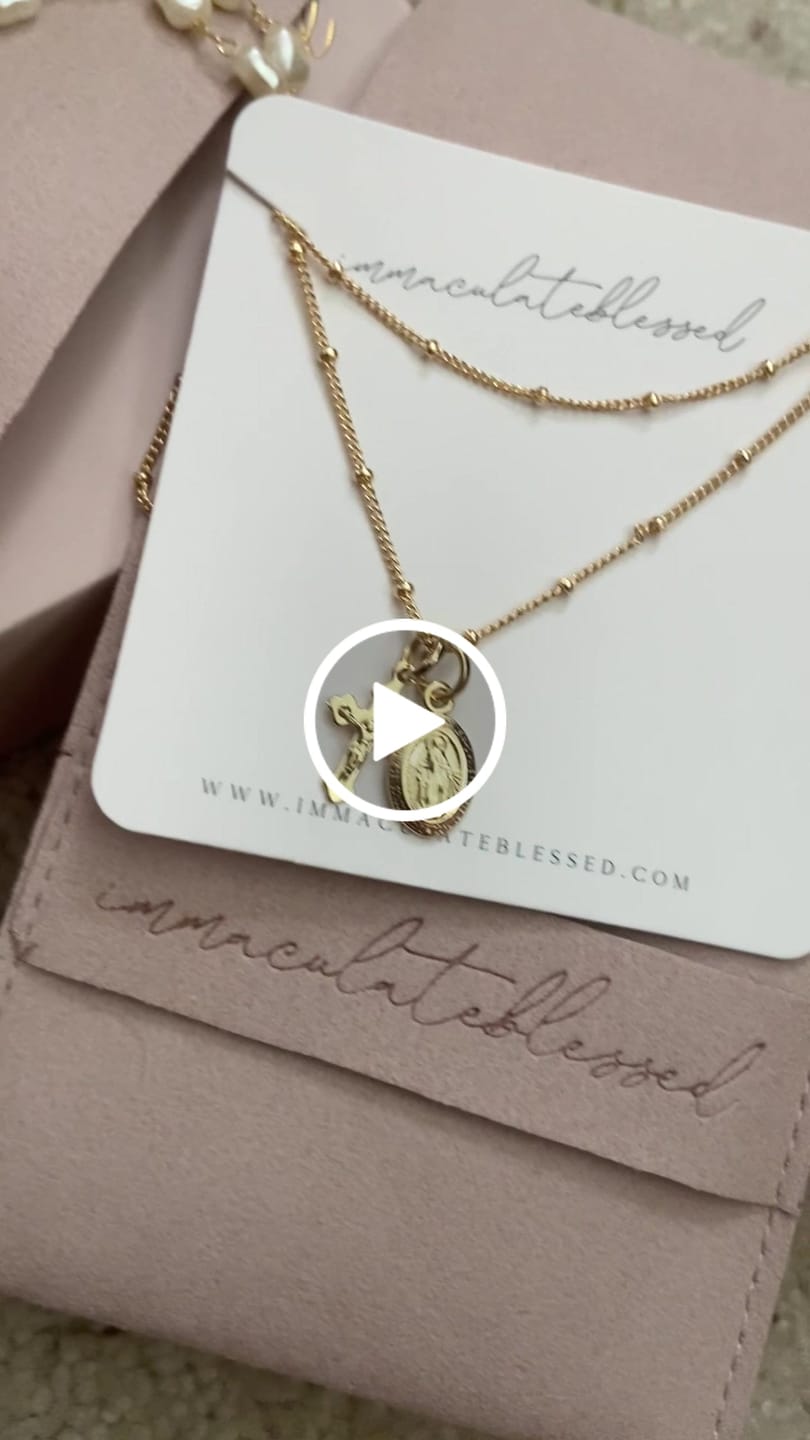 Customer video review of Layered Petite Miraculous Medal + Petite Crucifix Gold Filled Satellite Chain + Pearl Necklace