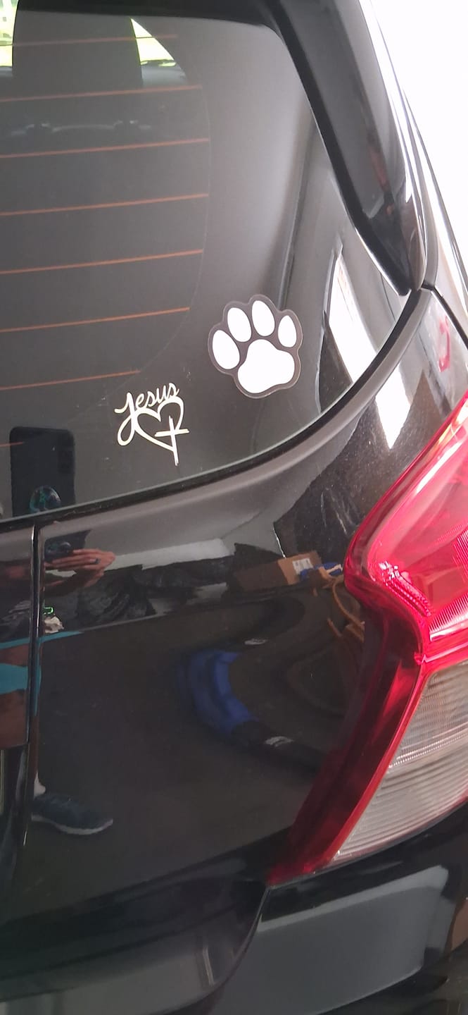 Customer photo review of Christianartworkshop Jesus Heart & Cross Accent Car Sticker: A Gentle Nudge to Pause and Pray