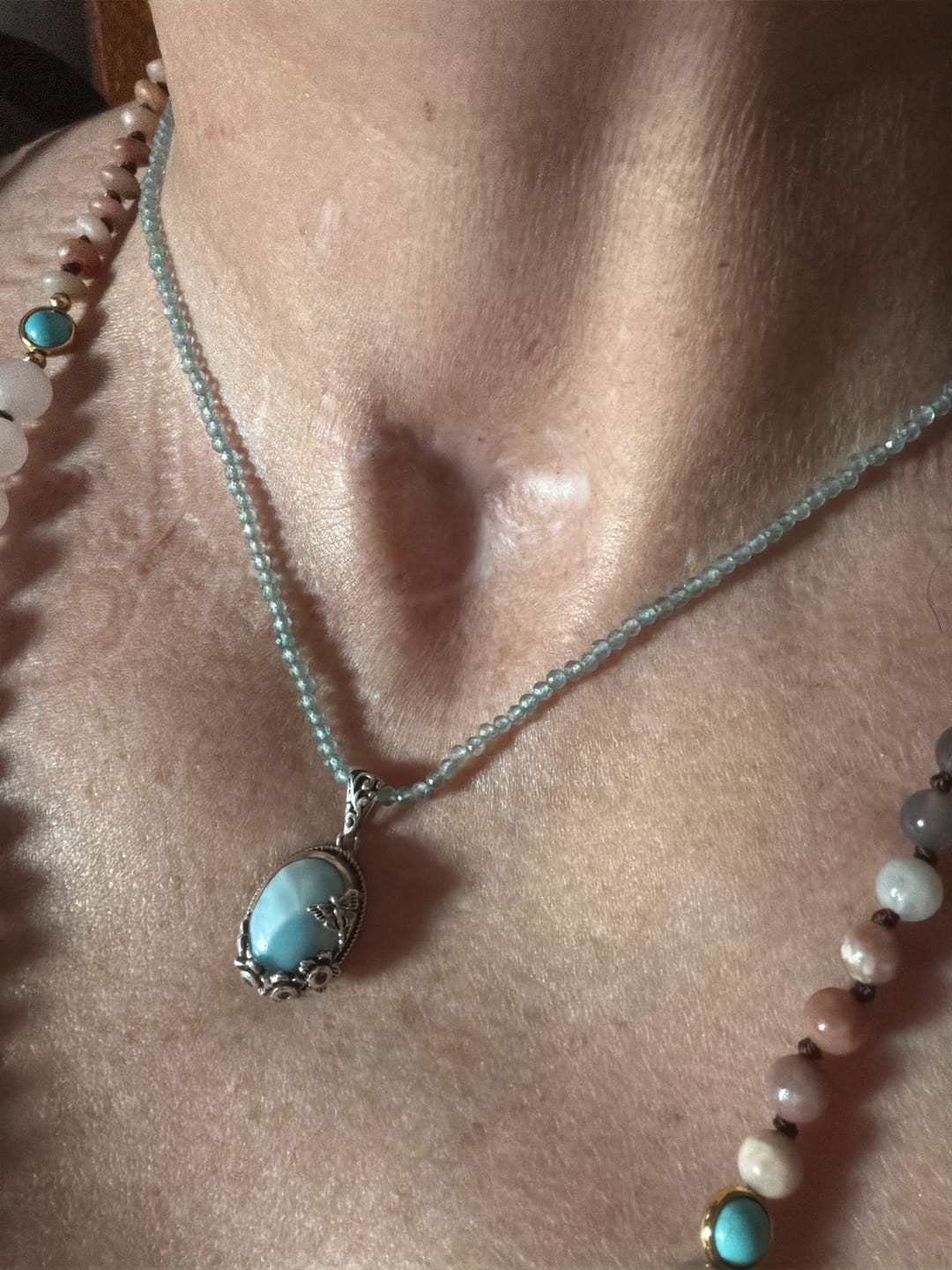 Customer photo review of Caribbean Larimar Pendant - Artisan Crafted Stress Relief Talisman