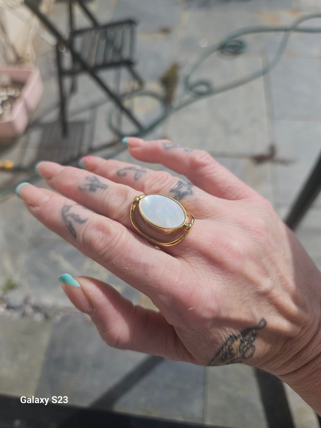 Customer photo review of All Kinds of Love - Gold Swivel Ring with Rhodonite and Mother of Pearl