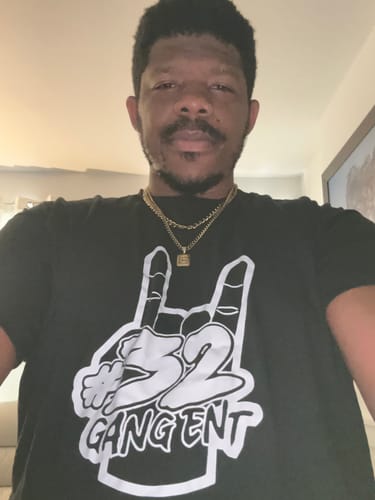 Customer photo review of 32 GANG BUDGET TEE
