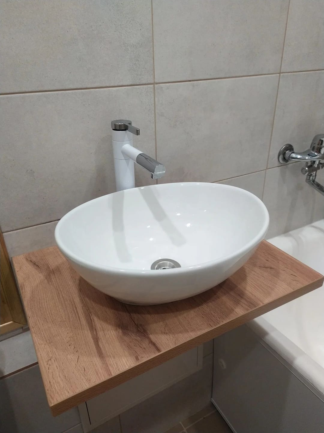 Customer photo review of Torneira Monocomando Dourada Para Banheiro