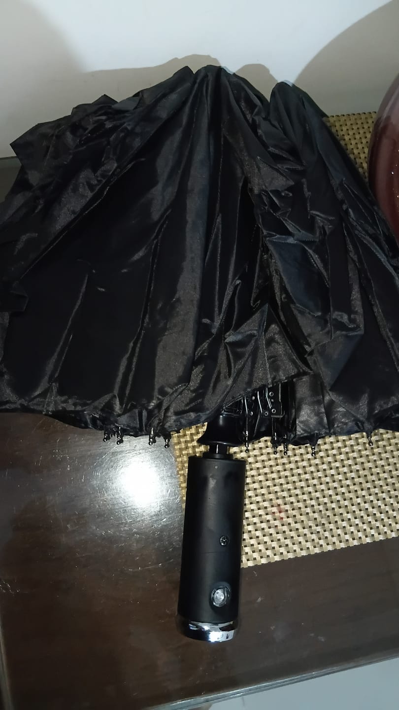 Customer photo review of UV Protected Umbrella with Torch - Unbreakable | Windproof | Waterproof