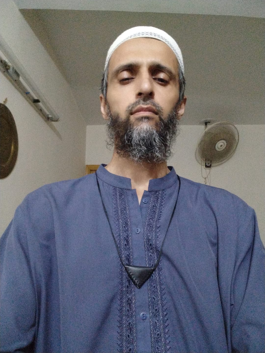 Customer photo review of Naqshbandi Taweez Necklace from Shaykh Nazim