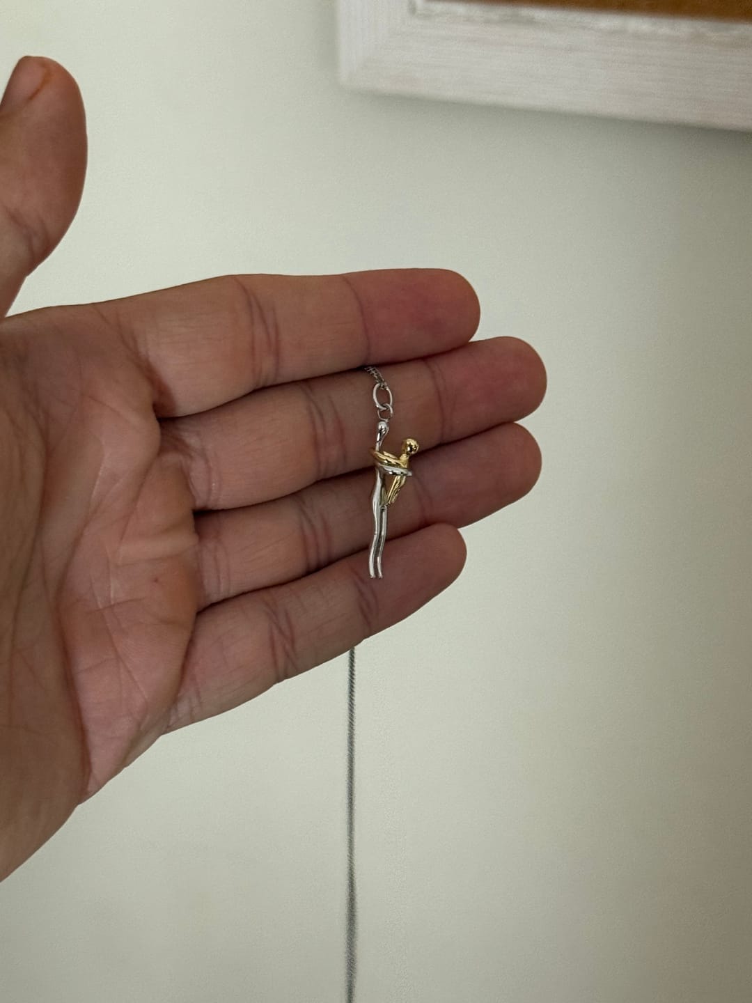 Customer photo review of Colar Abraço de Almas Gêmeas