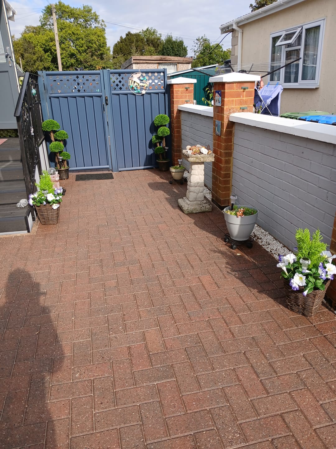 Customer photo review of Purple & White Petunia Rattan Patio Planters 60cm/24in (Set of 2) - A1193