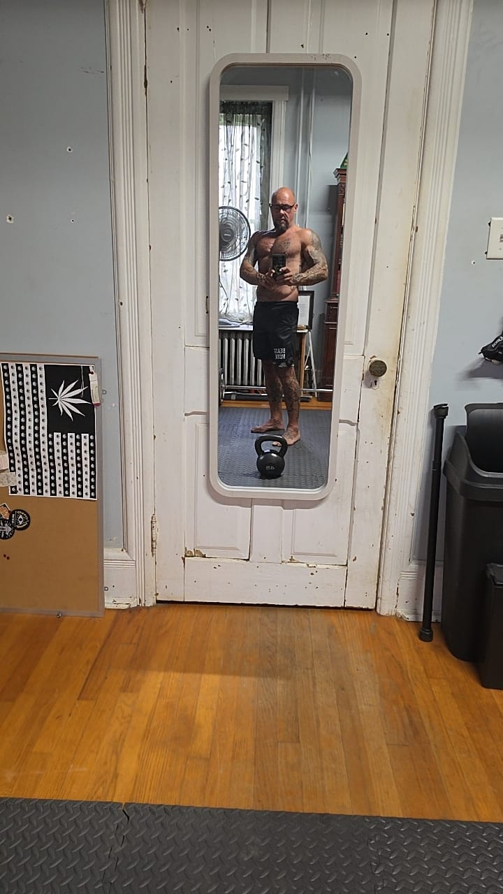 Customer photo review of American Flag Skulls Men's Gym Shorts 11550