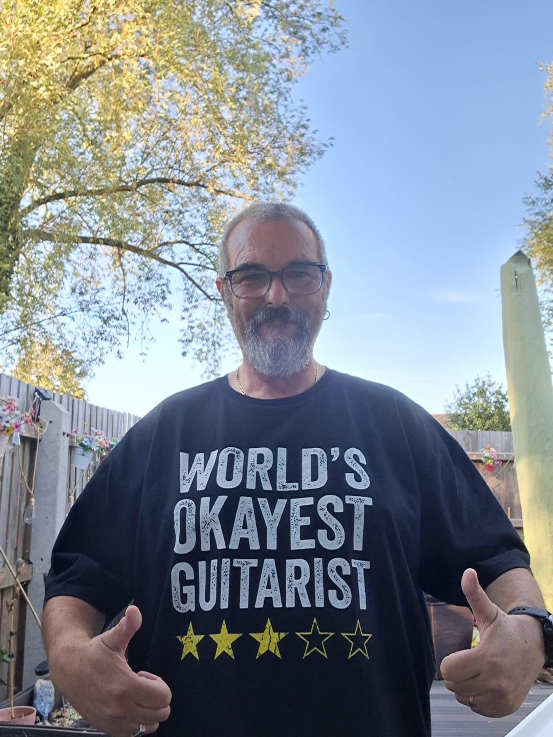 Customer photo review of World's Okayest Guitarist T-Shirt