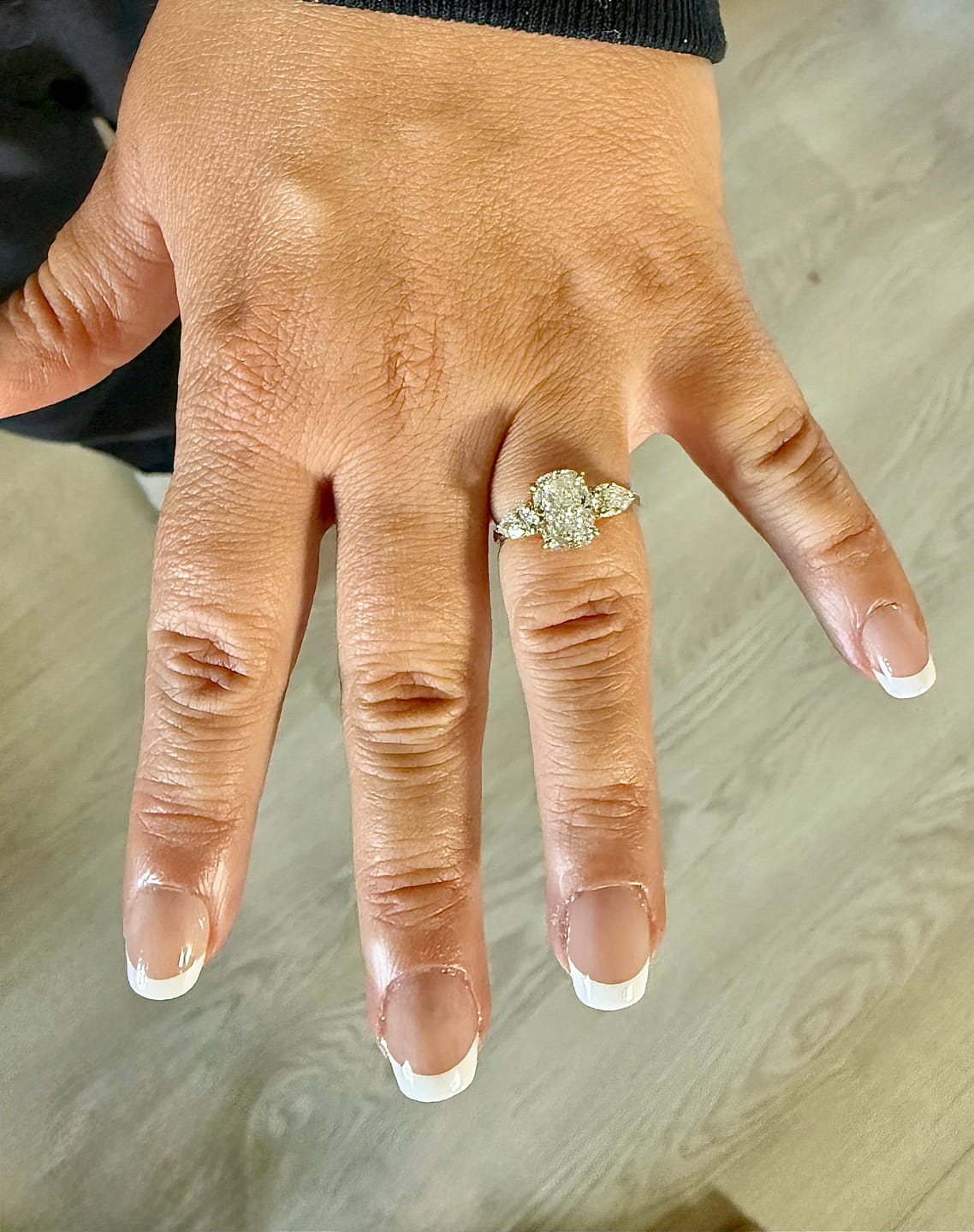 Customer photo review of Haley 2 Carat Three Stone Ring with Pear Side Stones and an Elongated Cushion Lab Grown Diamond in 14k Yellow Gold
