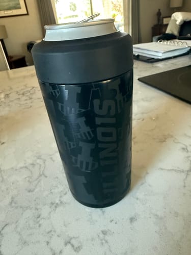Customer's black Illinois Fighting Illini Universal Buddy can cooler standing on a kitchen counter.