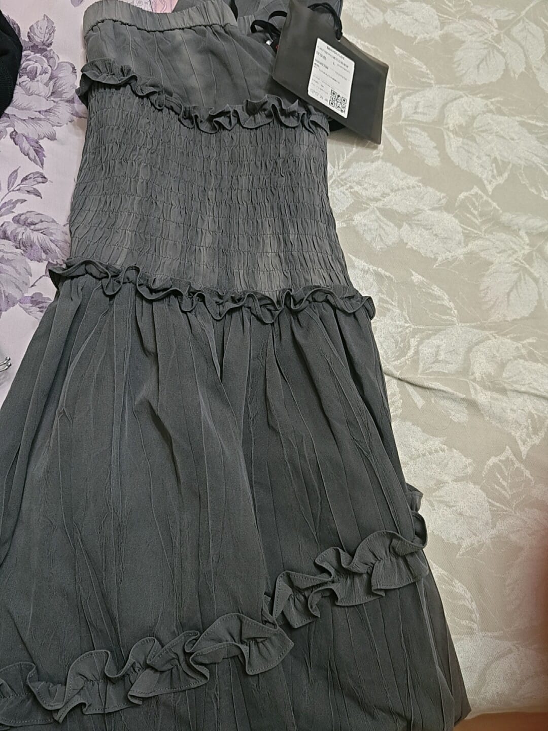 Customer photo review of DOINDULGE Asymmetric Smocked Maxi Skirt