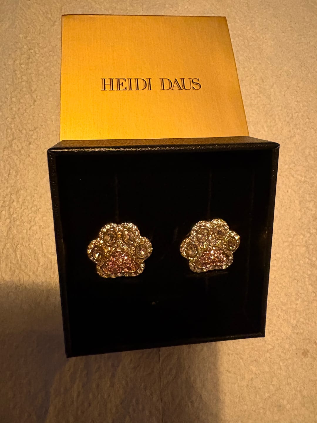 Customer photo review of HEIDI DAUS® "Pretty Paw Print" Crystal Paw Print Earrings – Dog & Cat Lover Jewelry