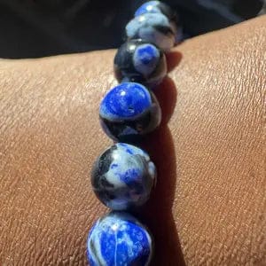 Customer photo review of FuAttract Calm Protection & Balance Blue Fire Agate Energy Bracelet