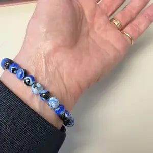 Customer photo review of FuAttract Calm Protection & Balance Blue Fire Agate Energy Bracelet