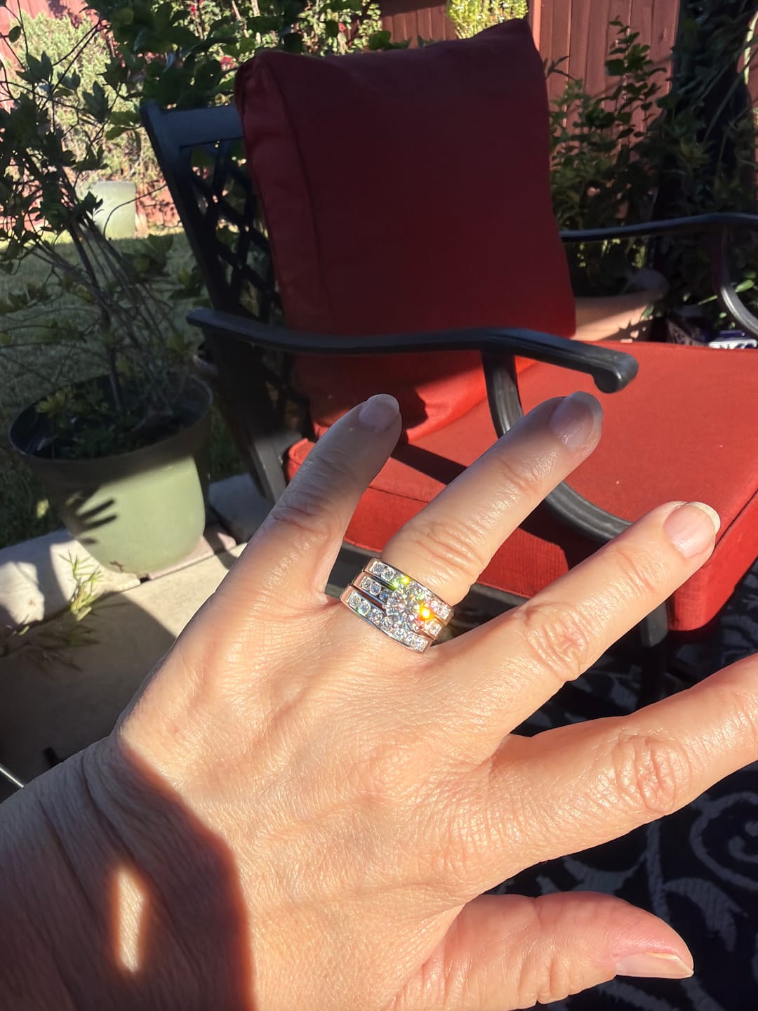 Customer photo review of Channel Set Moissanite Half Eternity Wedding Band Ring In Sterling Silver