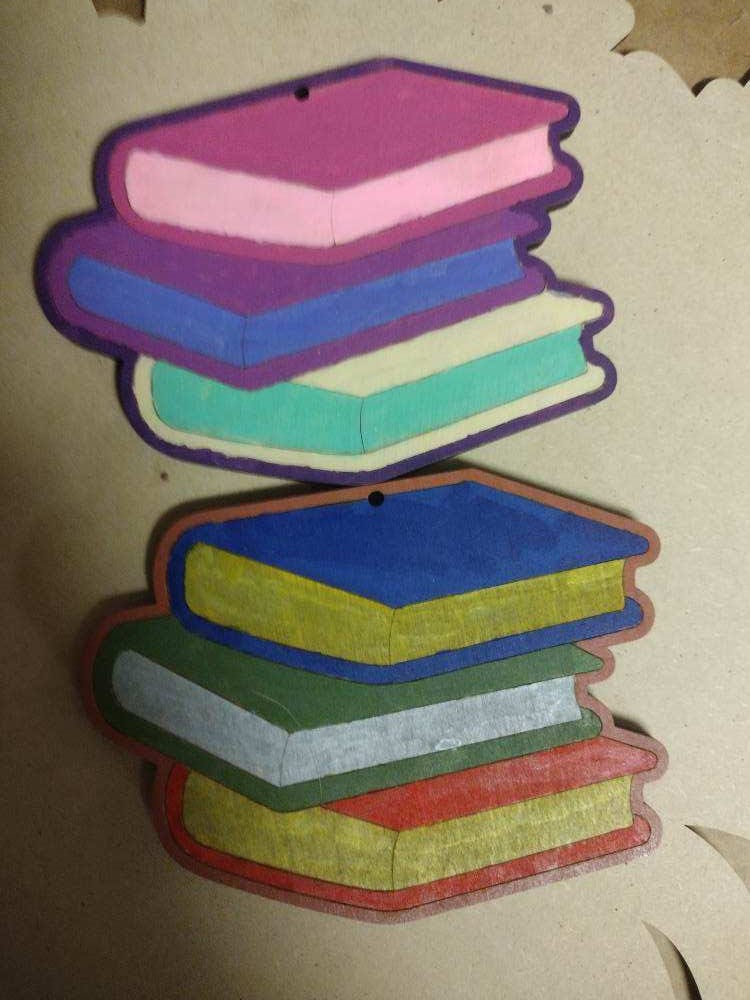 Customer photo review of Unfinished Wood Etched Stack of Books Shape | Paint By Line Crafts | up to 30" DIY