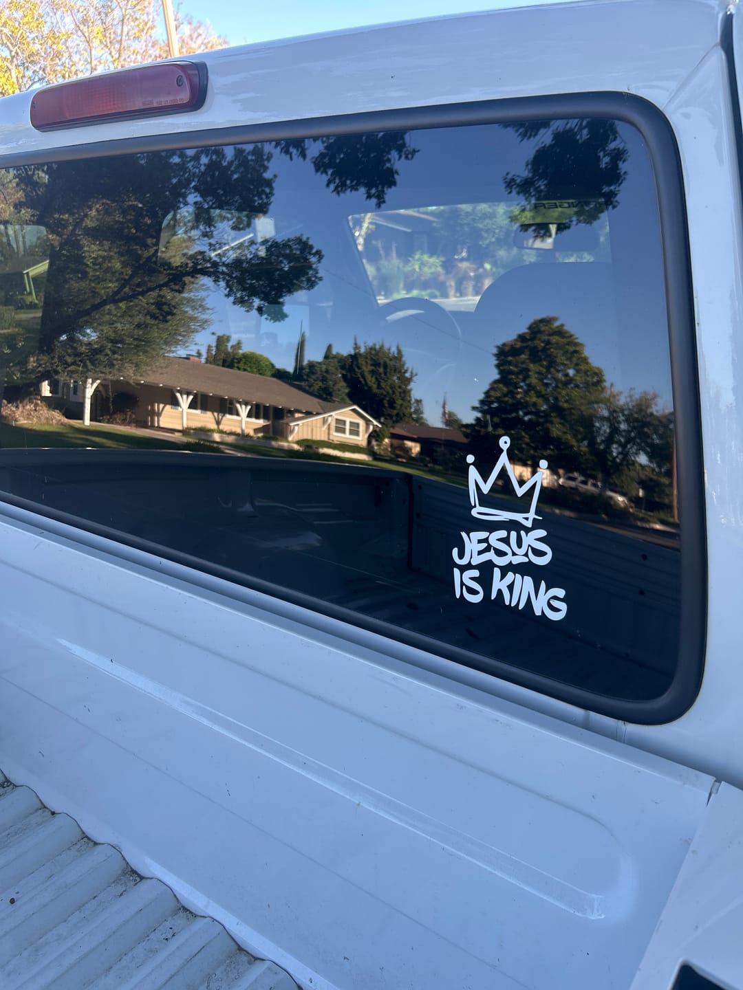 Customer photo review of Christianartworkshop Jesus Is King Crown Accent Car Sticker: Durable Decor for Faith-Filled Commutes
