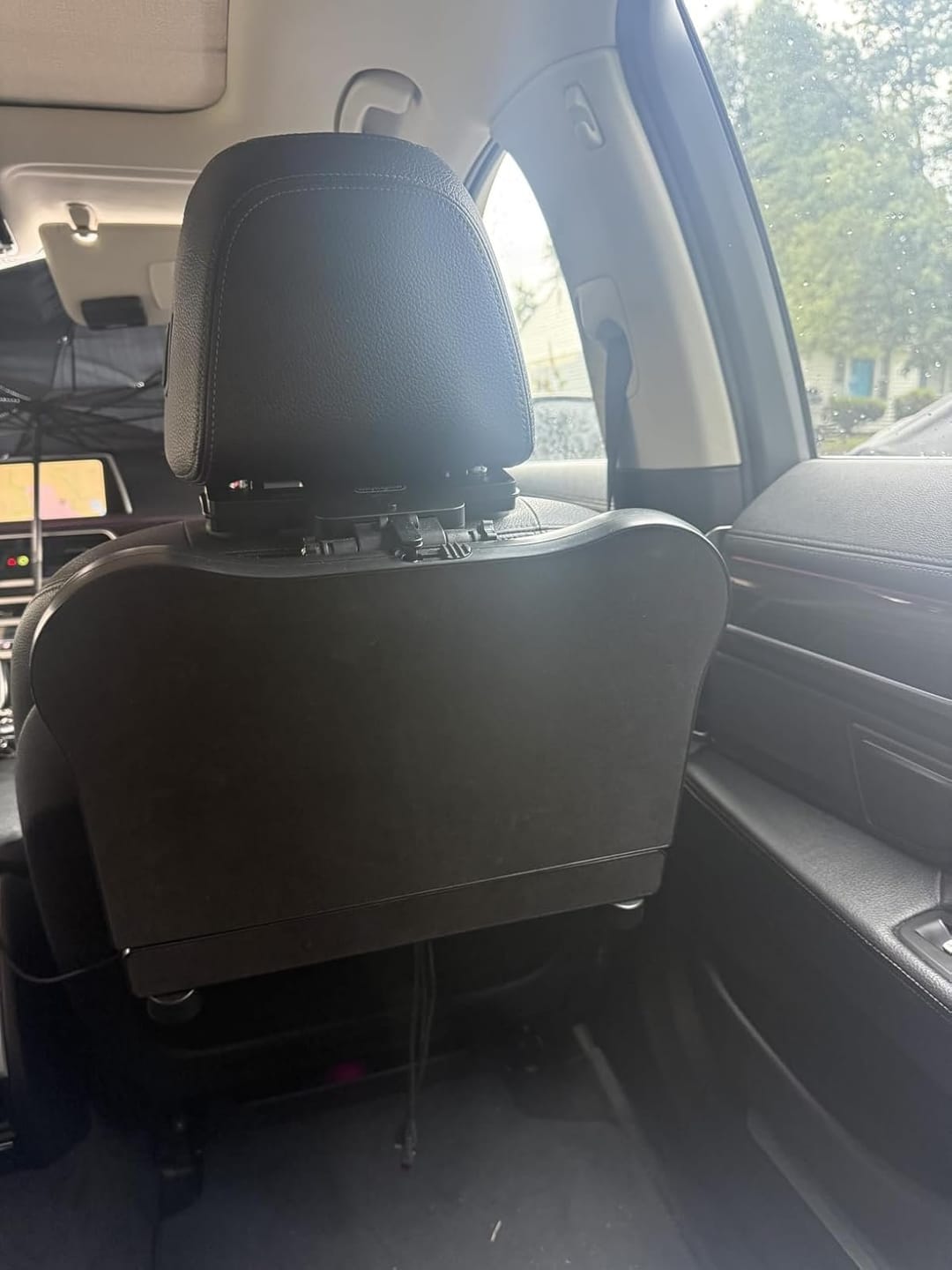 Customer photo review of BOLTHUT™ Folding Backseat Tray Table — Cup & Phone Holder