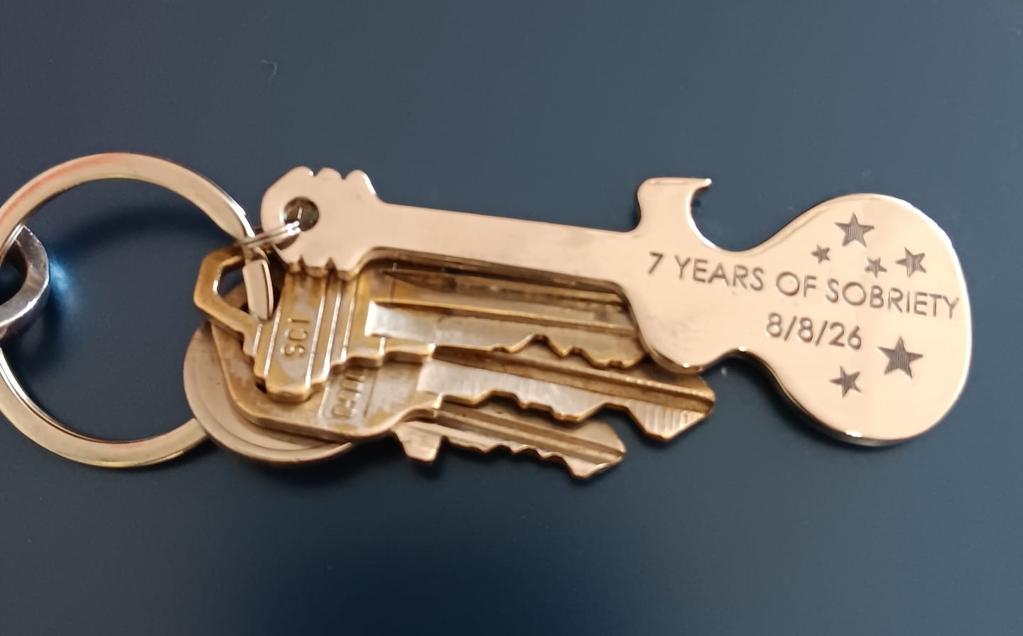 Customer photo review of Personalized Guitar Bottle Opener Keychain, Engraved Music Valentines Gift for Him, husband, dad