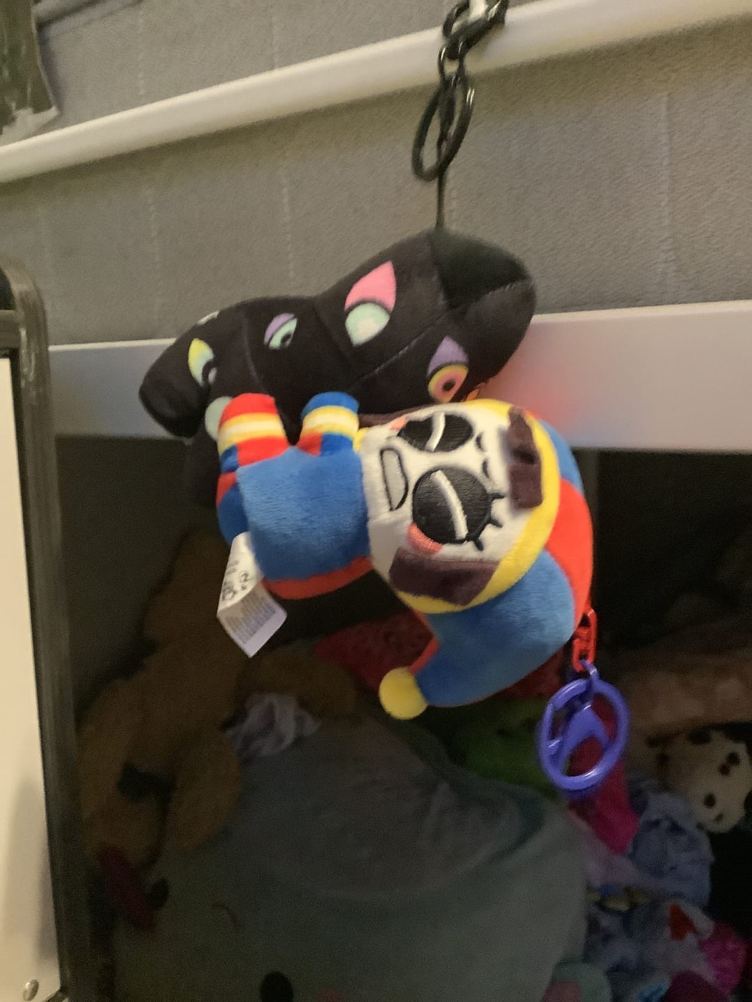 Customer photo review of Pomni & Abstraction Magnetic Plush Keychains