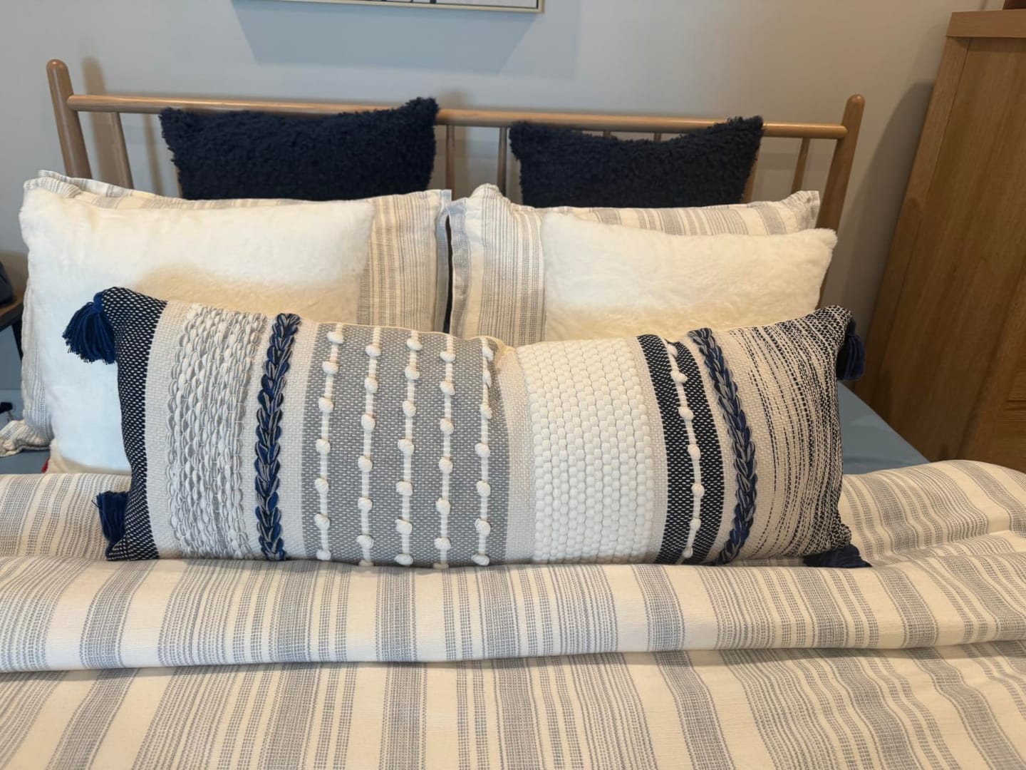 Customer photo review of Signature Handmade Dark Blue Woven Long Lumbar Pillow Cover 14x36