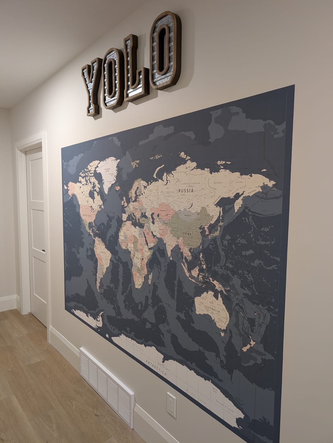 Customer photo review of Blue World Map Dark - Dark Vintage World Map Wallpaper Mural