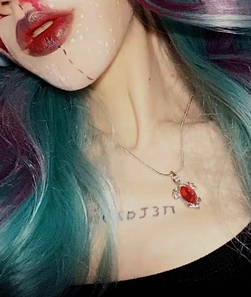 Customer photo review of BIRTHSTONE PENDANT