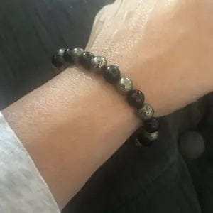 Customer photo review of FuAttract Wealth Prosperity & Success Energy Black Obsidian Pyrite Fortune Bracelet
