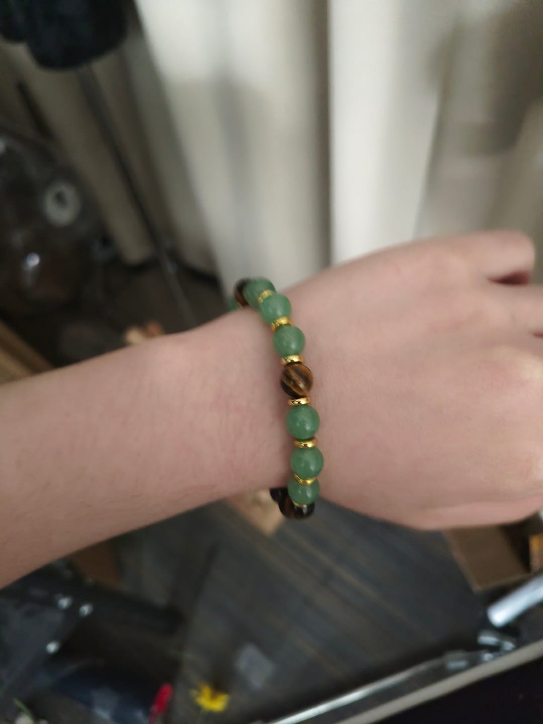 Customer photo review of FuAttract Wealth Confidence & Prosperity Tiger Eye Green Aventurine Fortune Bracelet