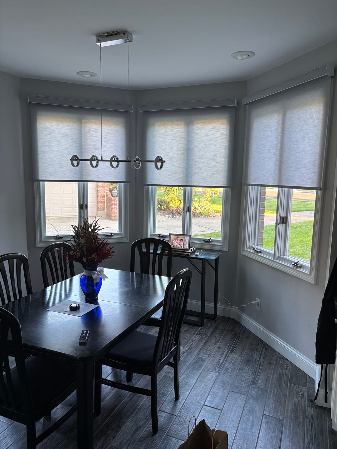 Customer photo review of SmartWings Motorized Light Filtering Roller Shades 70% Blackout Essential