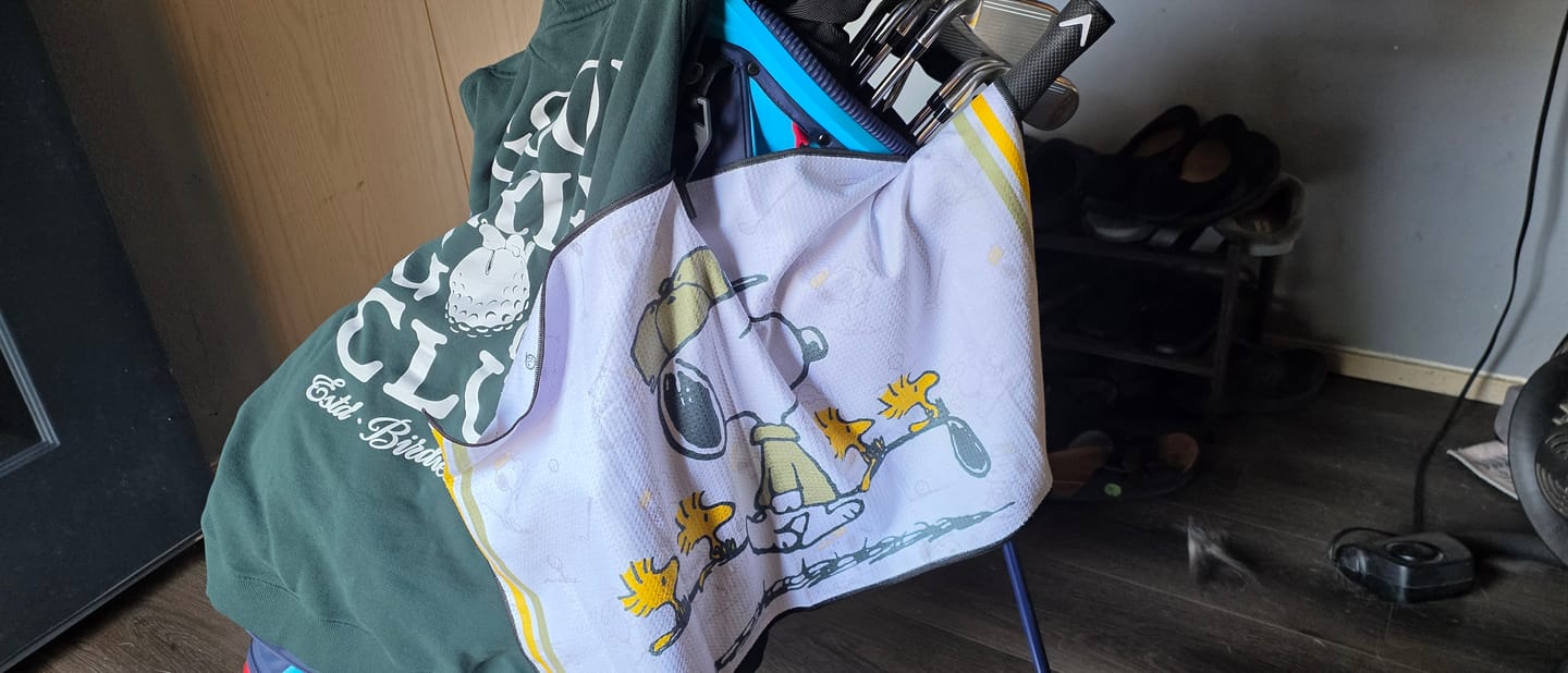 Customer photo review of Peanuts Snoopy Golf Academy - Magnetic Golf Towel