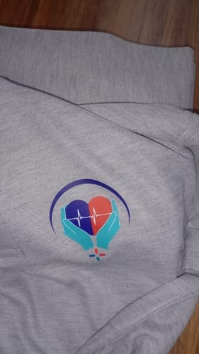 Customer photo review of Customized Polo T-Shirt With Your Company Logo | PrintMine.in